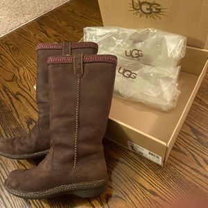 Uggs tall suede woman’s boot size 10 runs small due to the lining